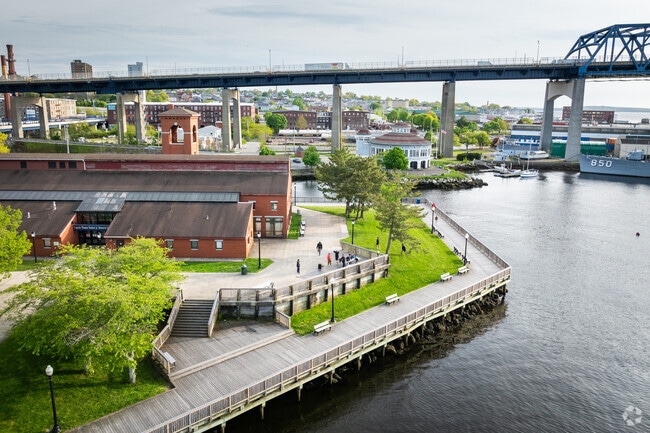 Enjoy the magnificent aerial view of Battleship Cove, just minutes away from North Tiverton.