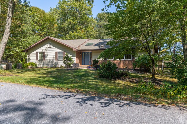 Tall trees provide shade to some homes in West Penn.