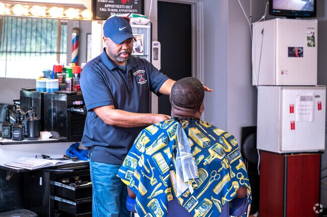 Brighton Alabamas local Barber at work