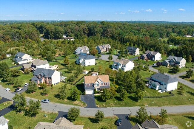 Powells Creek features spacious homes set among mature trees and scenic views.