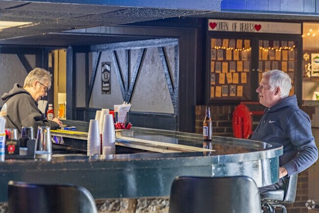 Delhi Pub is a dive bar near Cotillion Village that offers drinks, food, and pool.