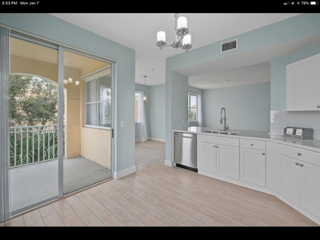 Kitchen with slider to balcony