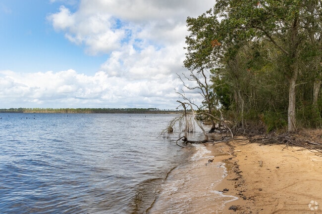 Perdido Bay has some quiet beaches beloved by Myrtle Grove residents.