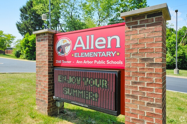 The lot entrance to Allen Elementary is located deep in the neighborhood on Towner Boulevard.