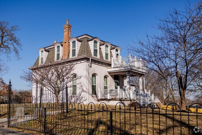 A unique second empire style home sits atop a hill in Neosho.