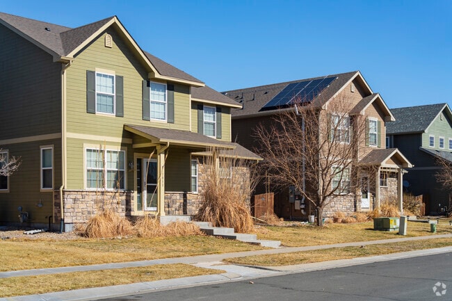 Hazeltine’s new home rows feature varied exteriors in neutral and pastel tones.
