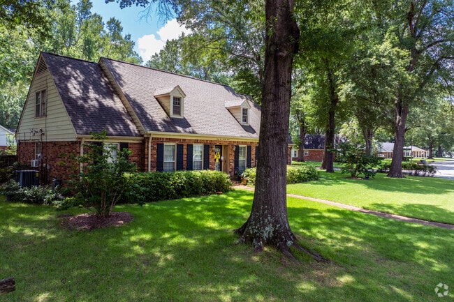 Cozy cottage-inspired homes with shaded yards line residential streets in Keswick Sulgrave.