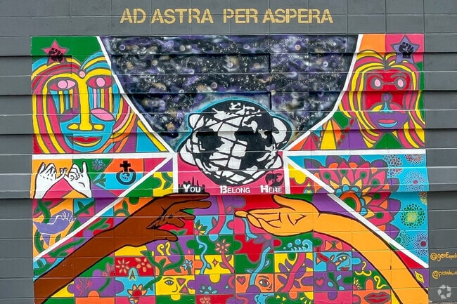 Kew Gardens Hills has murals is all around it.