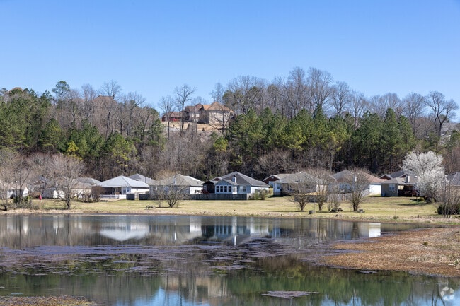 Pinson boasts a stunning scenic view of homes within a picturesque landscape.
