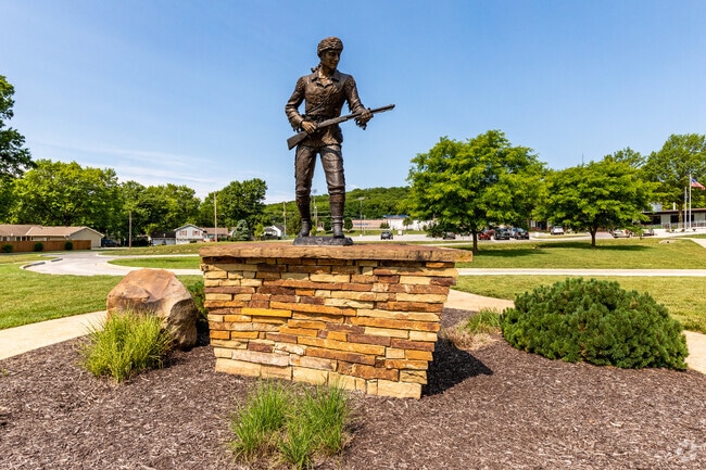 Leavenworth Senior High School has a large statue in the front of the campus.