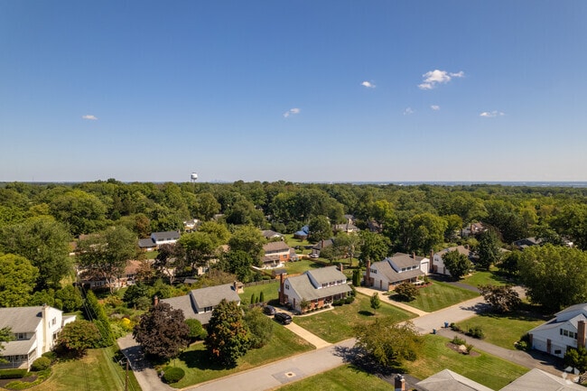 Most homes in Carrcroft have greenery all around.