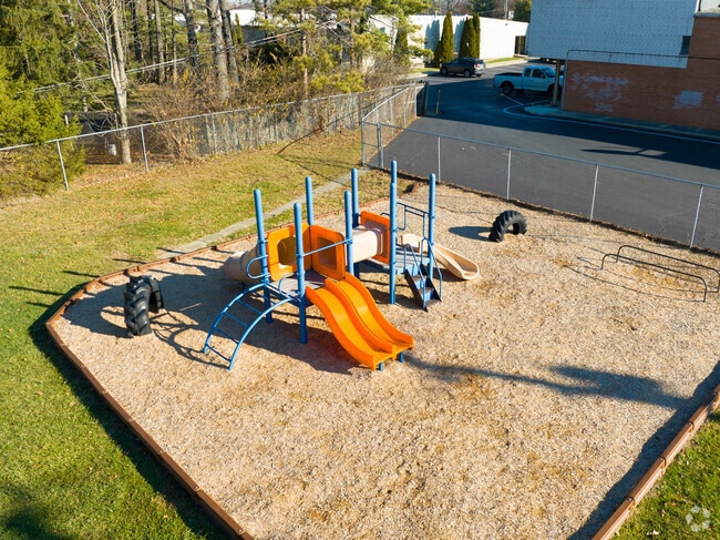 The students at Central Baptist enjoy recess in the back of the building.