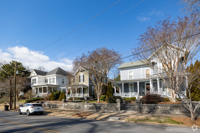 You'll discover some delightful Midcentury Residences tucked away in the vibrant heart of downtown Rome, GA.