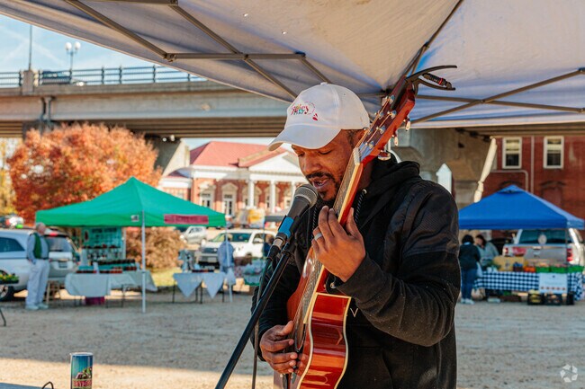 Live musicians perform at the weekly River Street Market held in Petersburg.