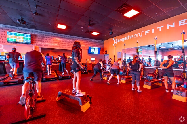 Achieve your fitness goals with energizing workouts at Orange Theory near Norterra.