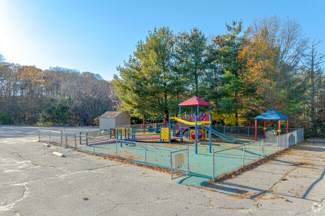 Globe Park School has colorful equipment and green surroundings.