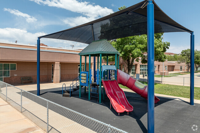 Covered playgrounds are available to students at Coral Cliffs Elementary School.