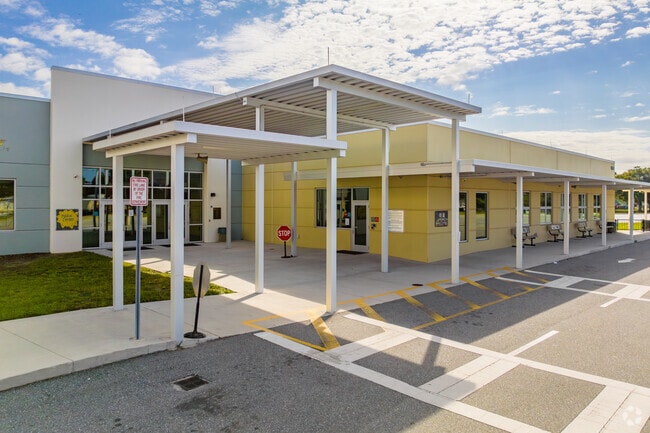 Sally Ride Elementary School features a large main entrance and student drop-off area.