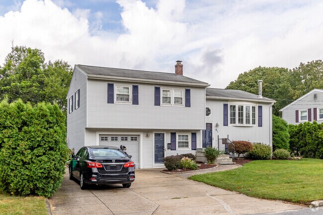A split-level house with a wonderful view graces the Buttonwoods neighborhood with sweetness.