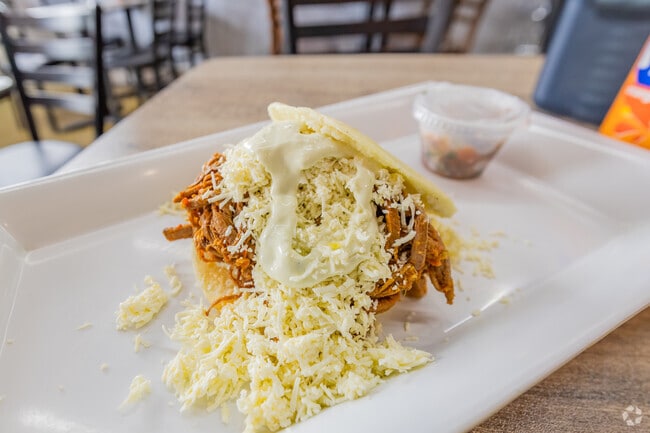 Charles And Larry has delicious arepas and comfortable seating for Sweetwater residents.