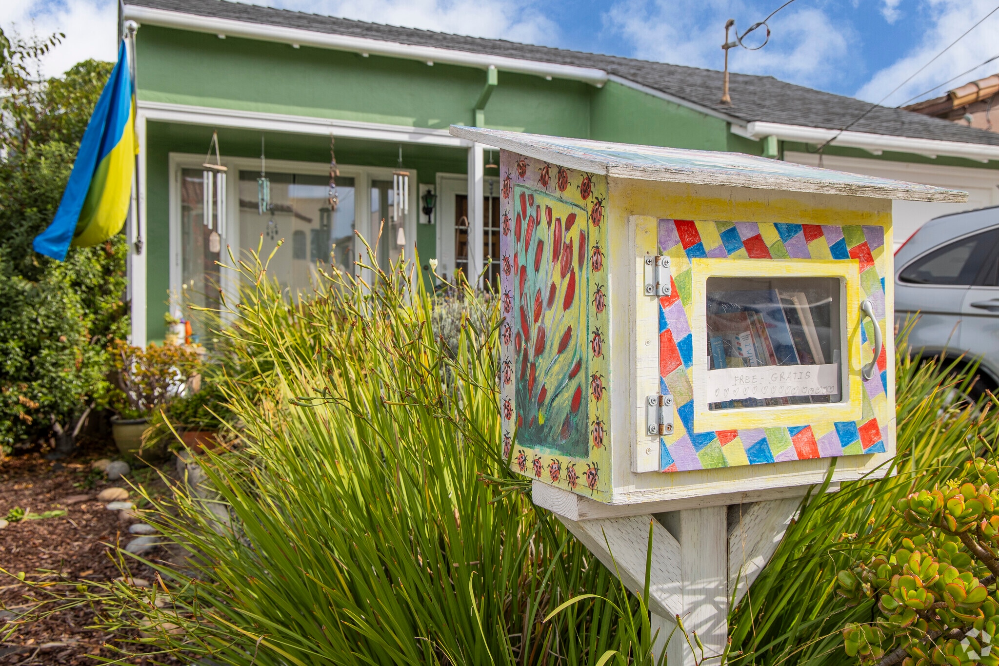 Colorful little free libraries can be seen in front of homes in Lomita Park.