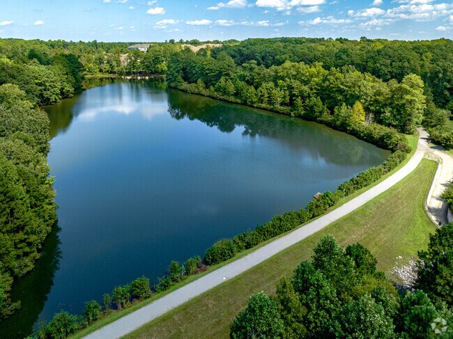 Tryon Road Greenway features a scenic walking path around a lake in Crossroads.