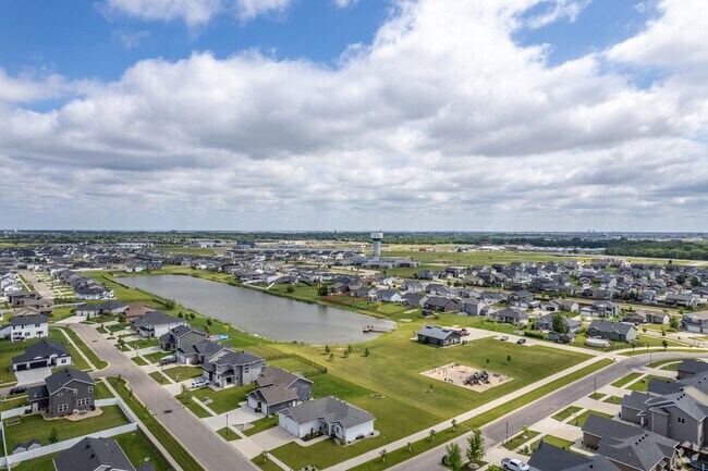 Brooks Harbor offers a picturesque setting with new homes and a tranquil community pond.