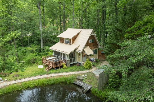 Many cottages are hidden in wooded areas around Saluda.