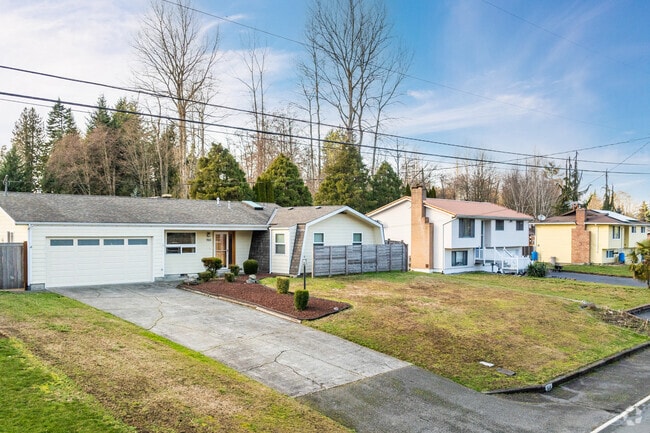 Ramblers and traditional homes line the streets of the Evergreen neighborhood.