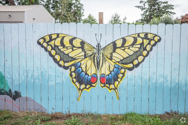 Admire a vibrant butterfly mural adding color to Northeast Salem.