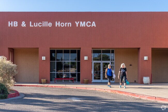 The HB and Lucille Horn Family YMCA in Sandia Ridge provides a hub for youth development and community recreation.