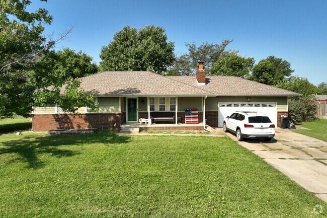 Ranch-style homes in Rose Hill have mature trees and spacious yards.