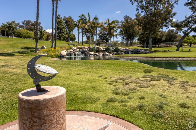 An antique sundial stands within Colina Del Sol Park.