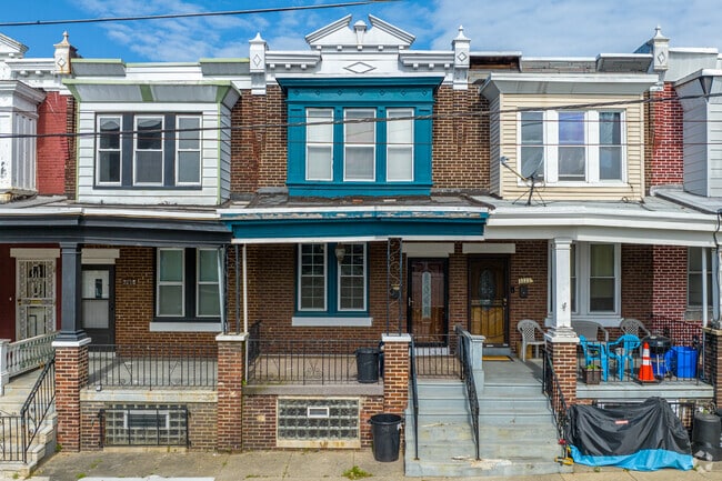 Allegheny West is home to Italianette style row homes with pops of color.