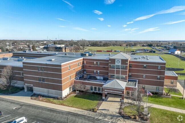 Sandwich Middle School has a grant front entrance into the building.