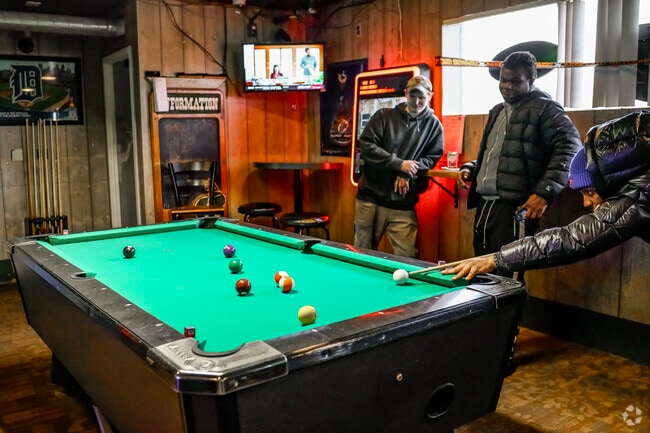 Head to Powell's Pub in Ypsi Riverside to play a game of pool or challenge a buddy to cornhole.