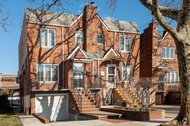 A two-bedroom brick rowhouse with a private garage costs about $800,000 in Sheepshead Bay.