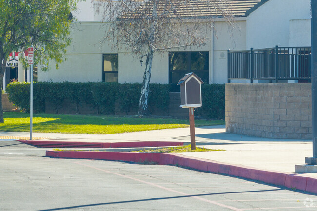 Willow Elementary School features a little library in front of campus.