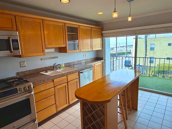 View from Kitchen and Balcony with Ocean/Pier views