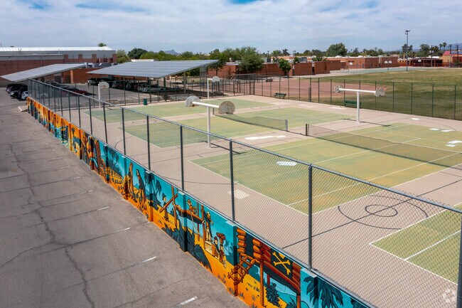 The Amphitheater Middle School
has combined basketball and tennis courts to maximize space.
