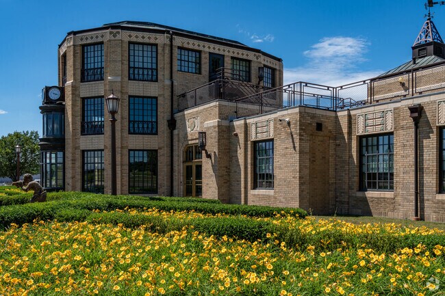 Beautiful gardens surround the grounds of the historic Akron Fulton Terminal building.
