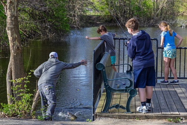 Tate Park visitors can also walk on riverside trails or fish from the shore of the River Raisin.