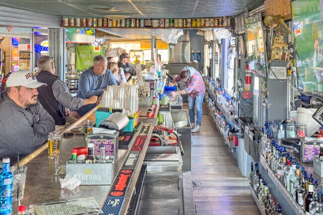 Watch the games with your friends at Sandbar Bar and Grill in Grass Lake.