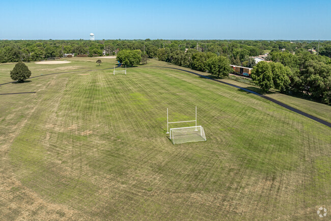 A large greenspace and soccer field are located behind Hoover Elementary School.