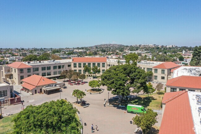 Nearby Woodrow Wilson High School with Signal Hill in the background.