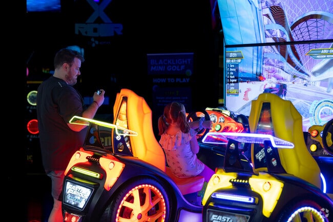Parents enjoy watching their children have a blast at Scene 75, close to Miami Chapel.