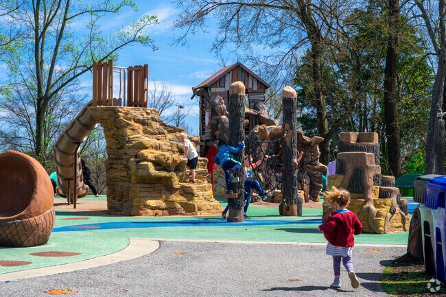 A jungle gym, small rock climbing wall and plenty of slides can be found at the Walker Mill Regional Park playground.