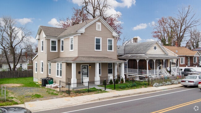 Large homes with stately columns line Addison Road in Seat Pleasant.