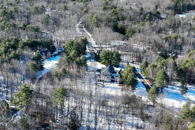 The North Gorham neighborhood is rural with homes mixed in with forest.