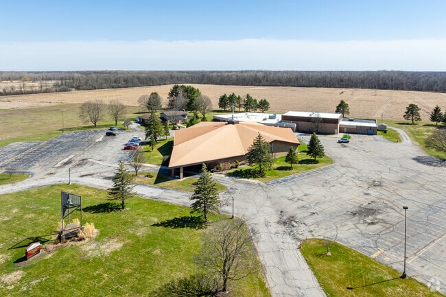 Sts. Peter & Paul Catholic School features a large play area behind the school for student recess.